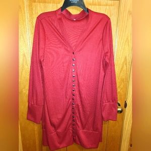 No name brand sweater      Red, light material, snaps from top to bottom sz 2XL
